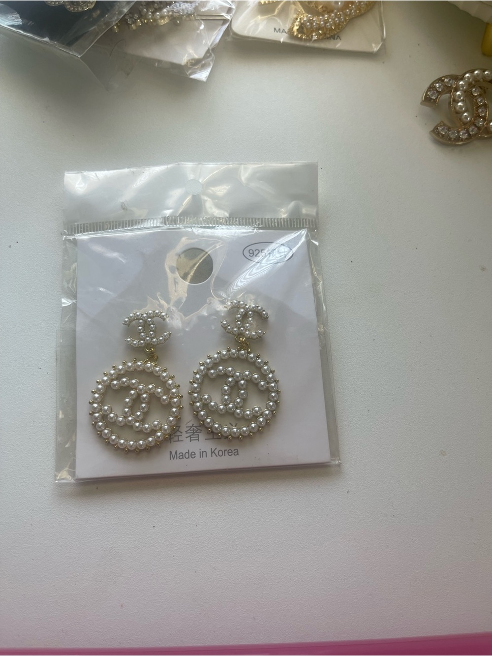 Women’s pearl dangling earrings